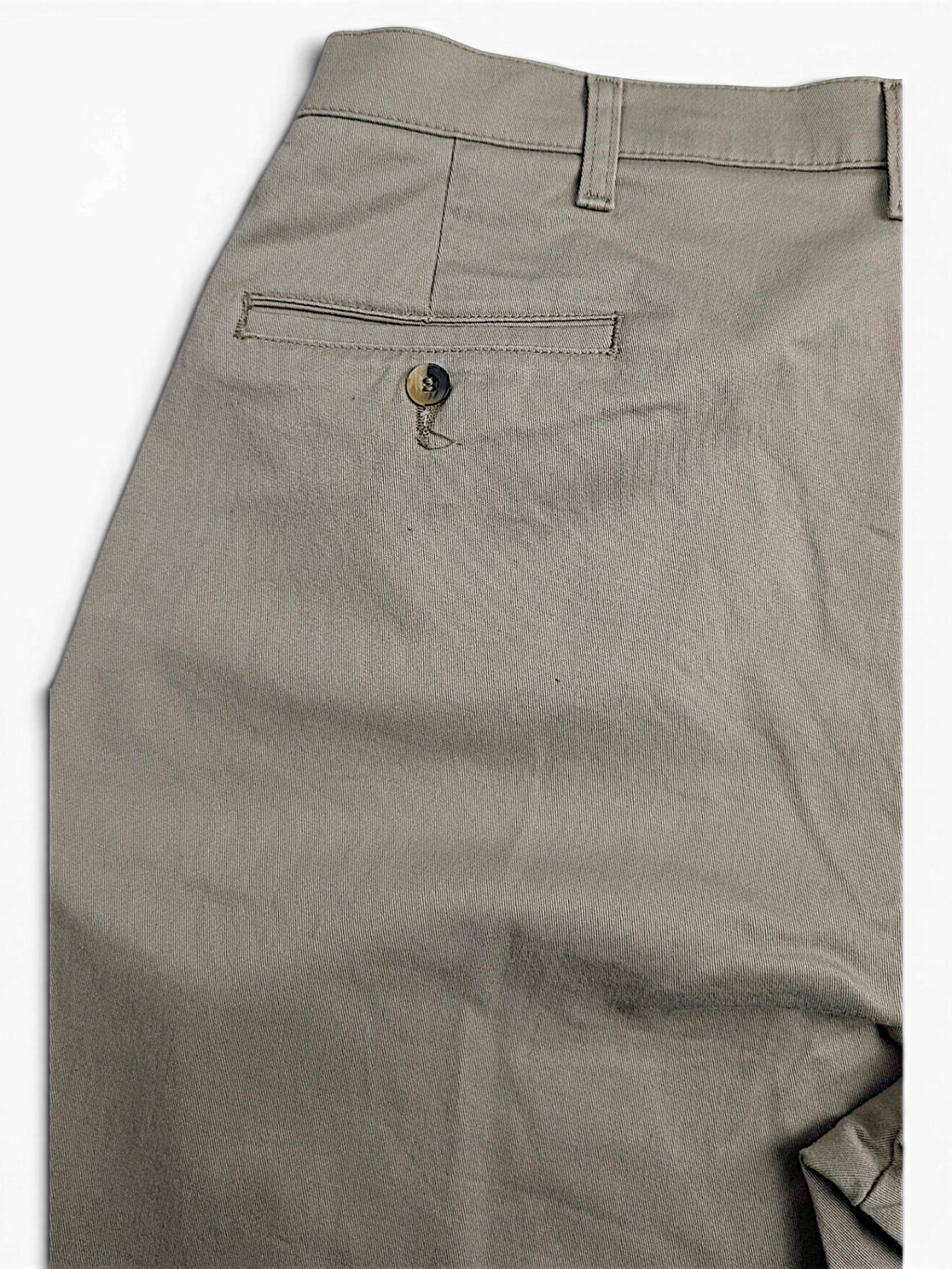 JAKE & IPI vintage beige cotton-blend pleated trousers featuring a single buttoned back pocket detail.