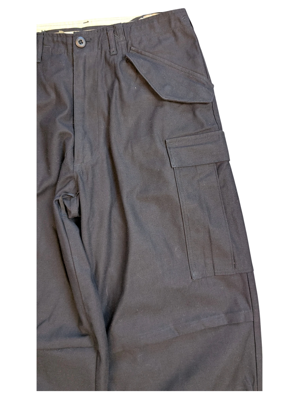 JAKE & IPI black cotton cargo pants with multiple pockets and button closure.
