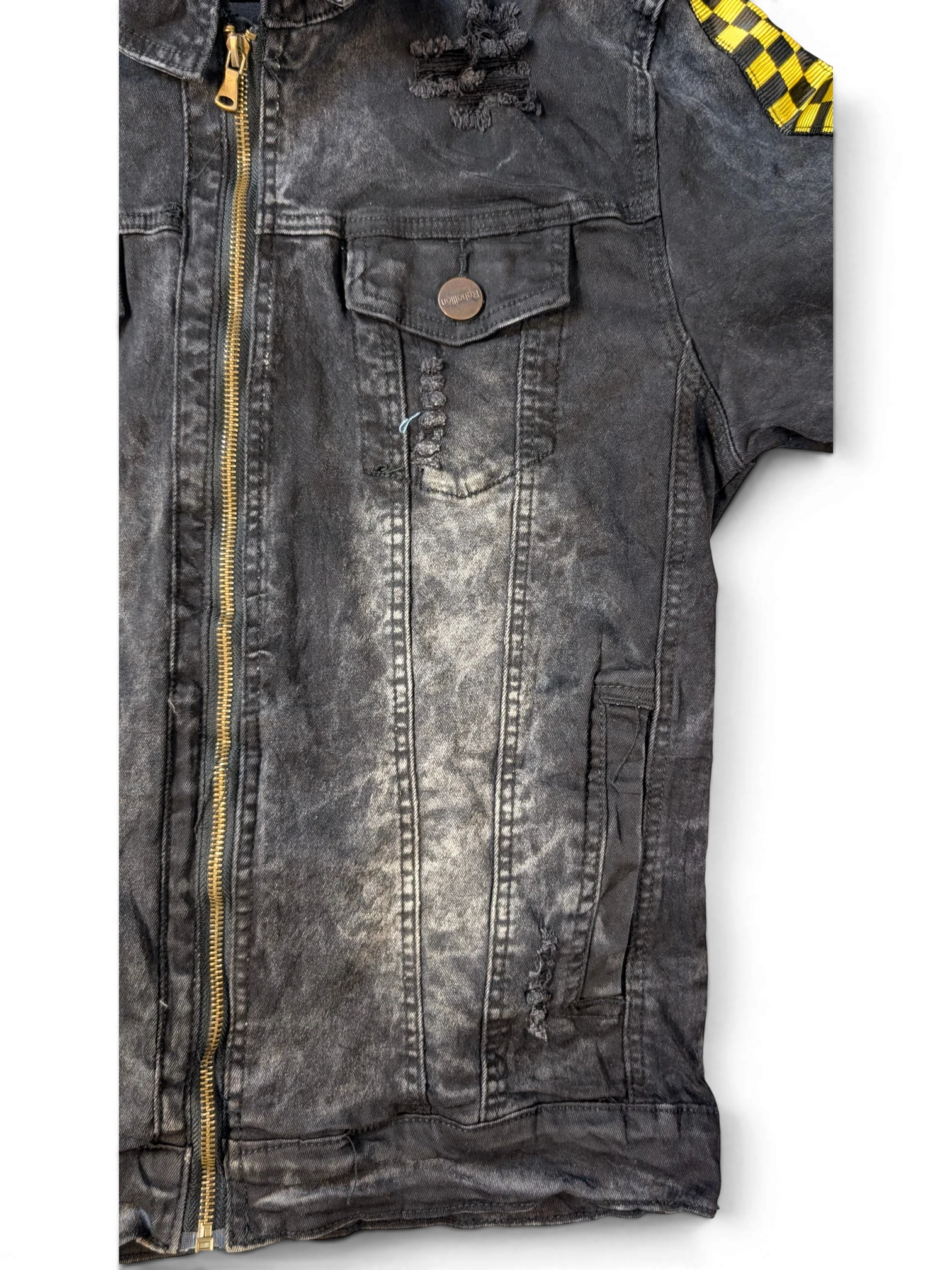 JAKE & IPI black distressed denim jacket with yellow checkered patch on sleeve and gold zipper.