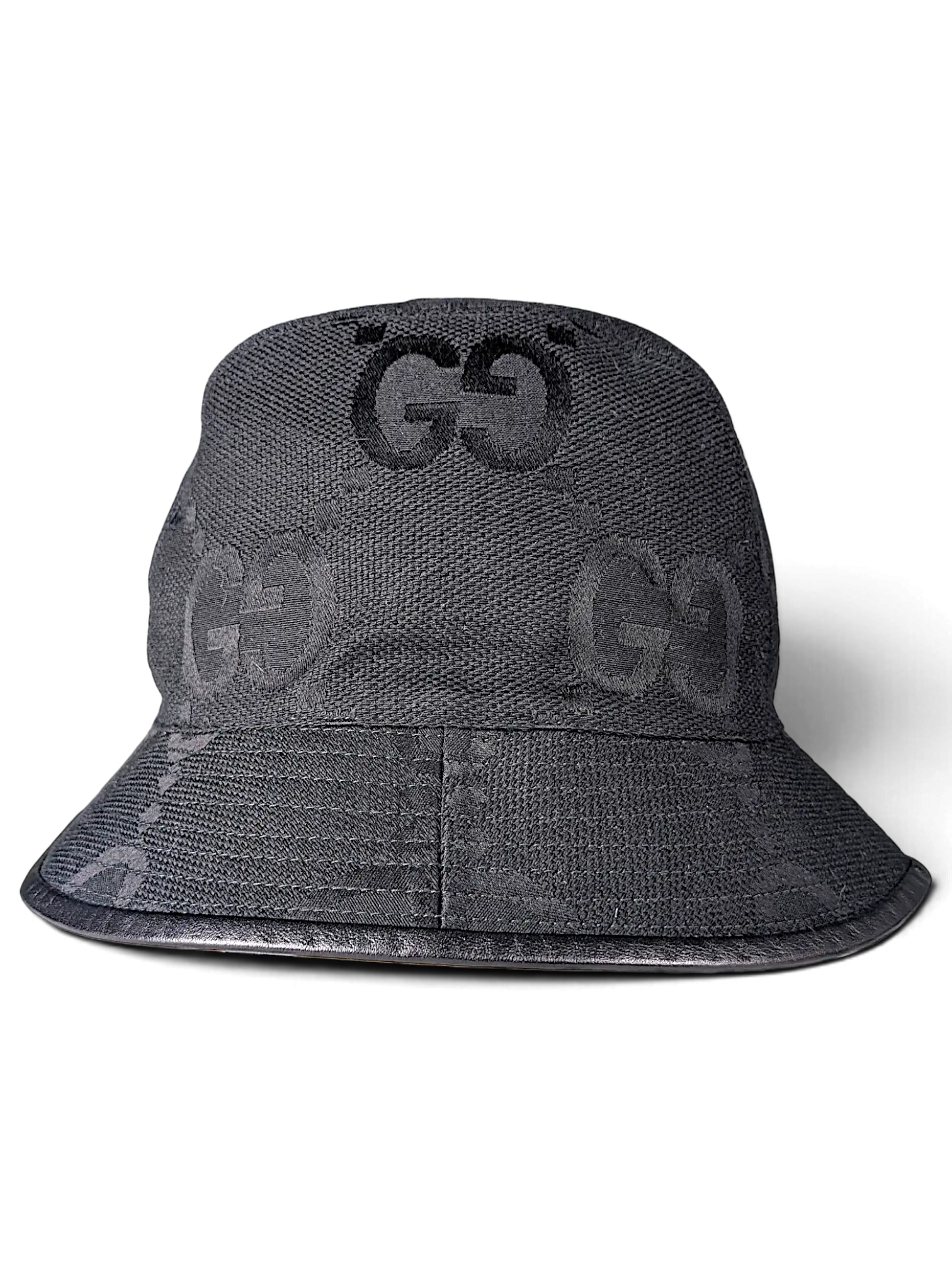JAKE & IPI black canvas bucket hat featuring the iconic Gucci GG monogram pattern and a leather brim trim.