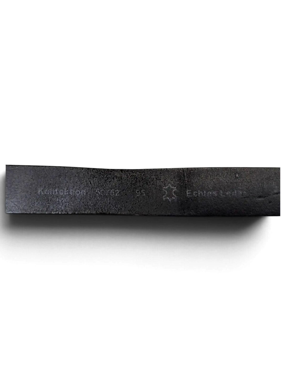 JAKE & IPI black leather belt showing embossed Konfection branding and Echtas Leder stamp on the inner strap