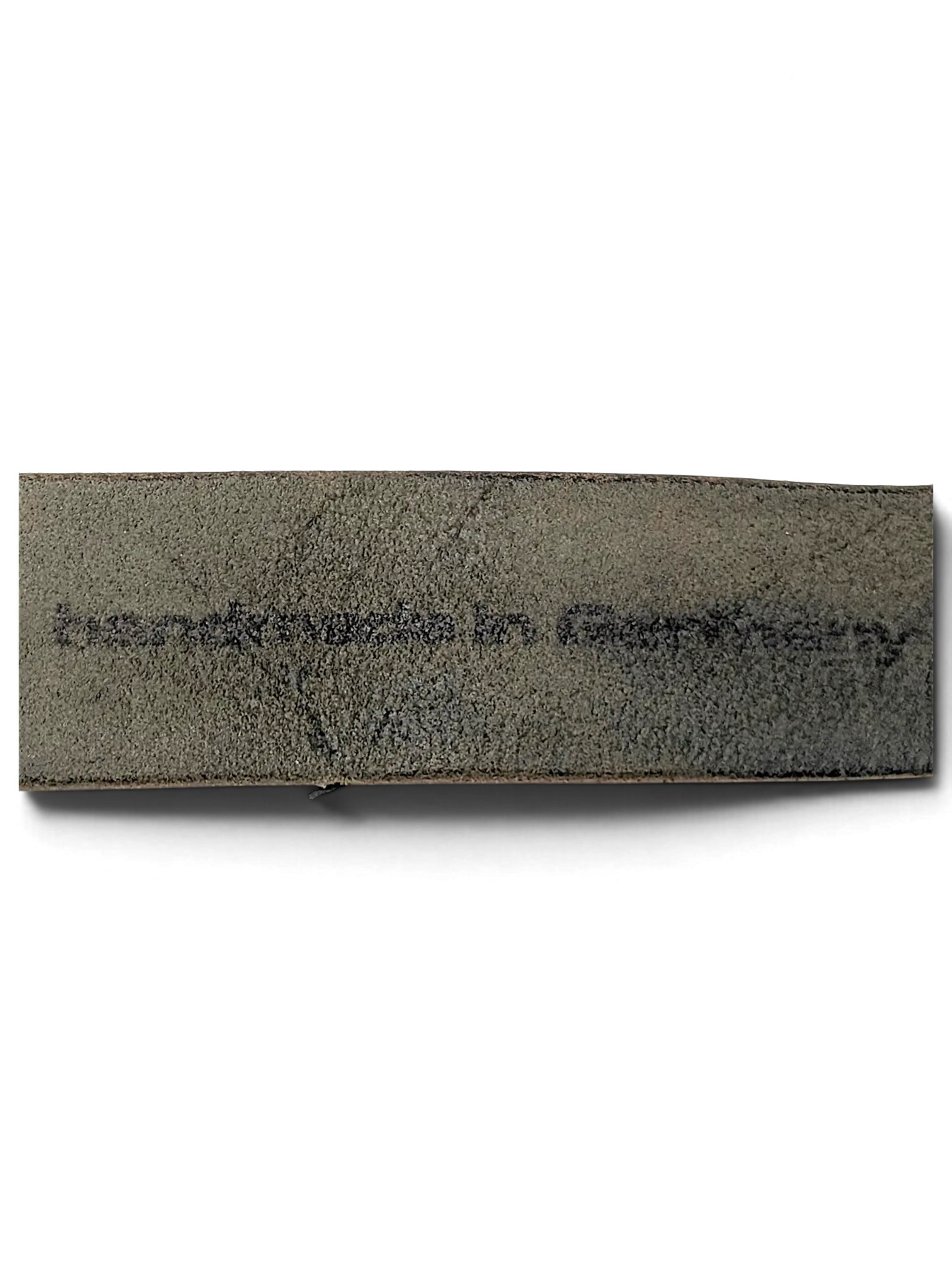 JAKE & IPI black leather belt featuring a handmade in Germany stamp on the textured inner surface