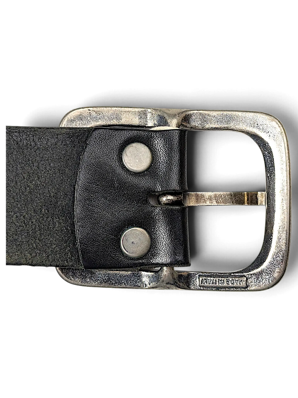 JAKE & IPI black leather belt featuring a distressed silver metal buckle and two rivets, close-up view.