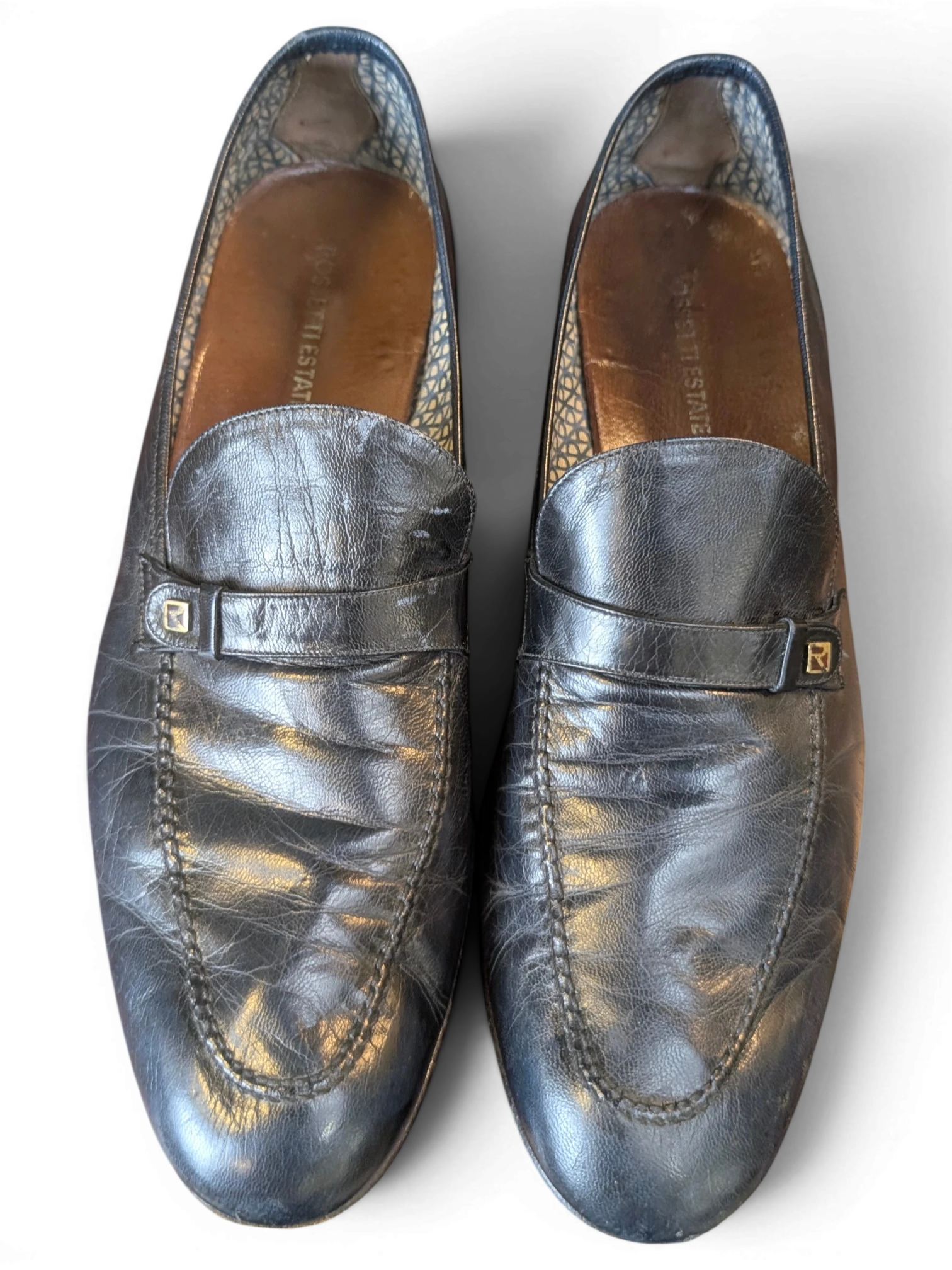JAKE & IPI black leather loafers with a strap detail and patterned interior lining