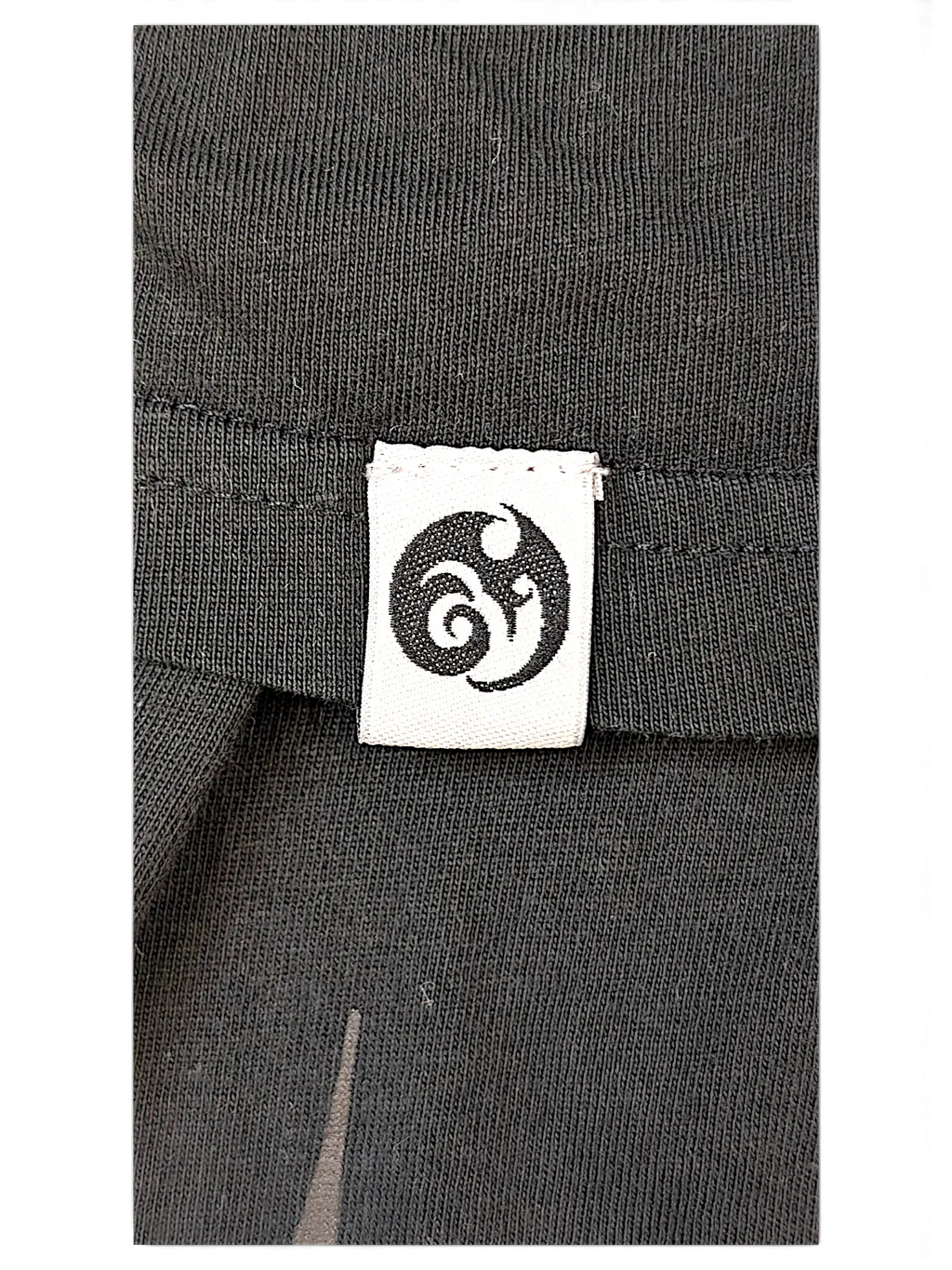 JAKE & IPI IBE Mori Velle long-sleeve shirt featuring a black cotton fabric with a white branded logo tag