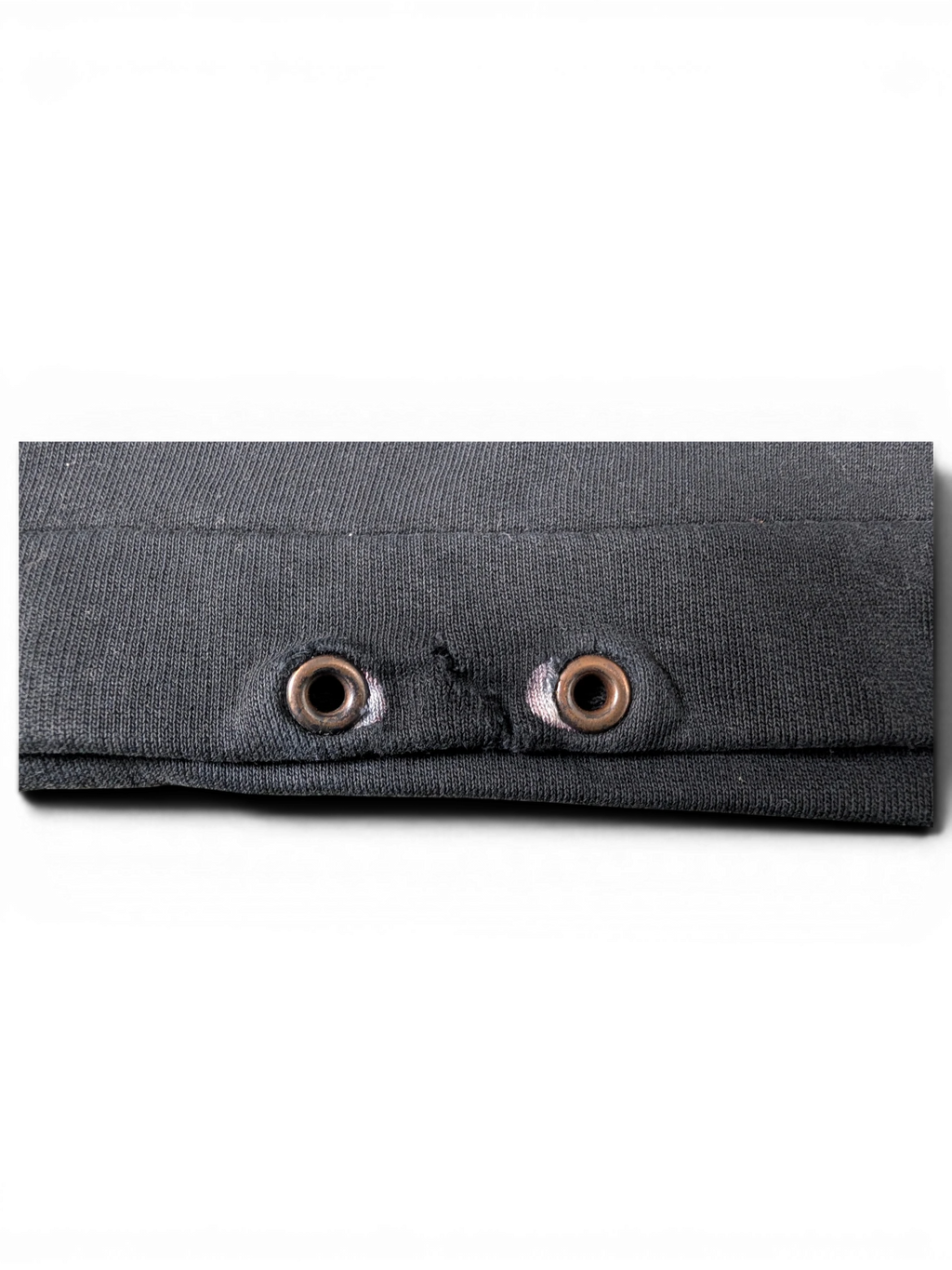 JAKE & IPI black cotton sweatshirt featuring metal eyelet details on the hood drawstring area.