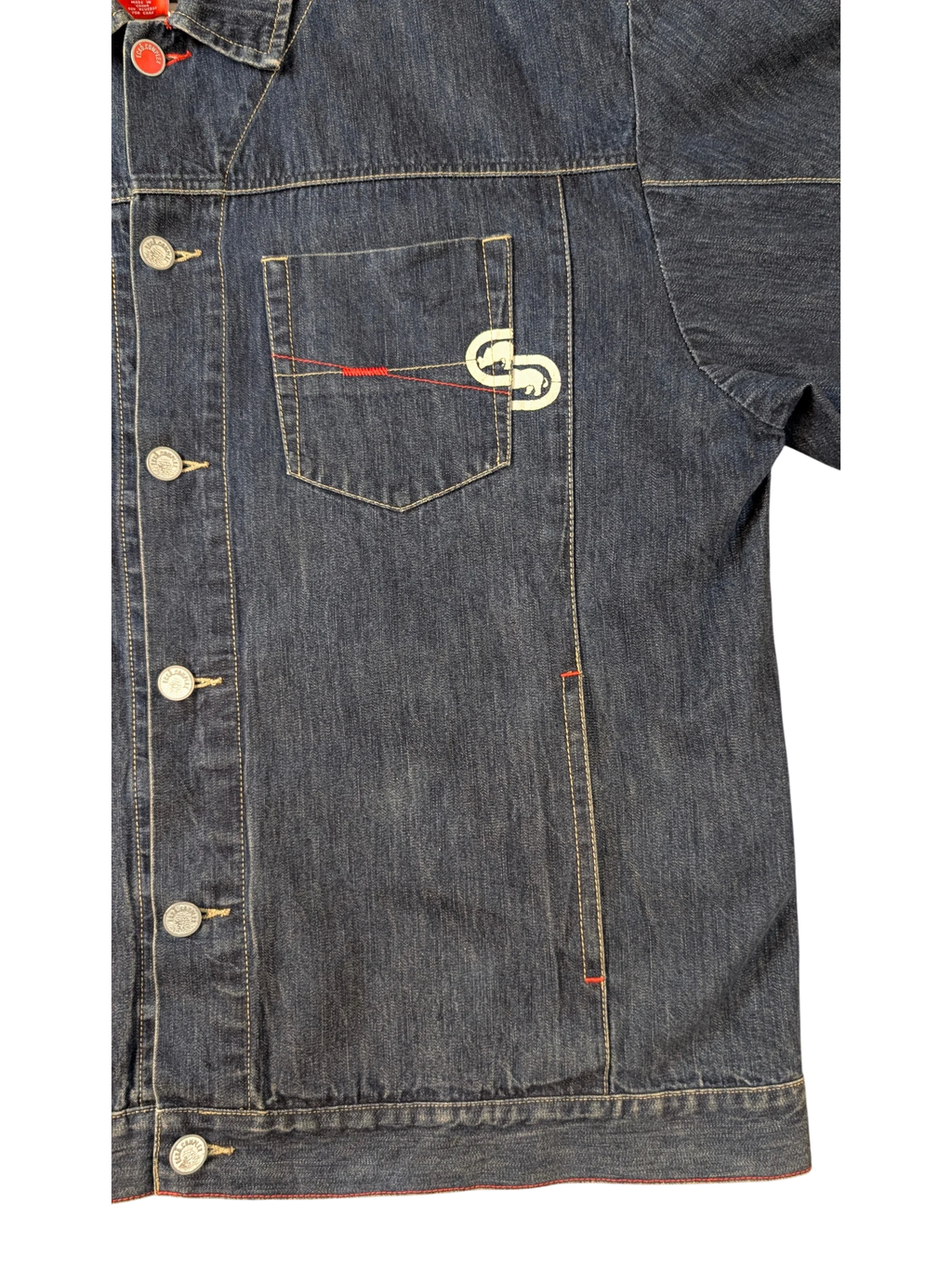 JAKE & IPI blue denim jacket with red stitching detail and embroidered logo on chest pocket.