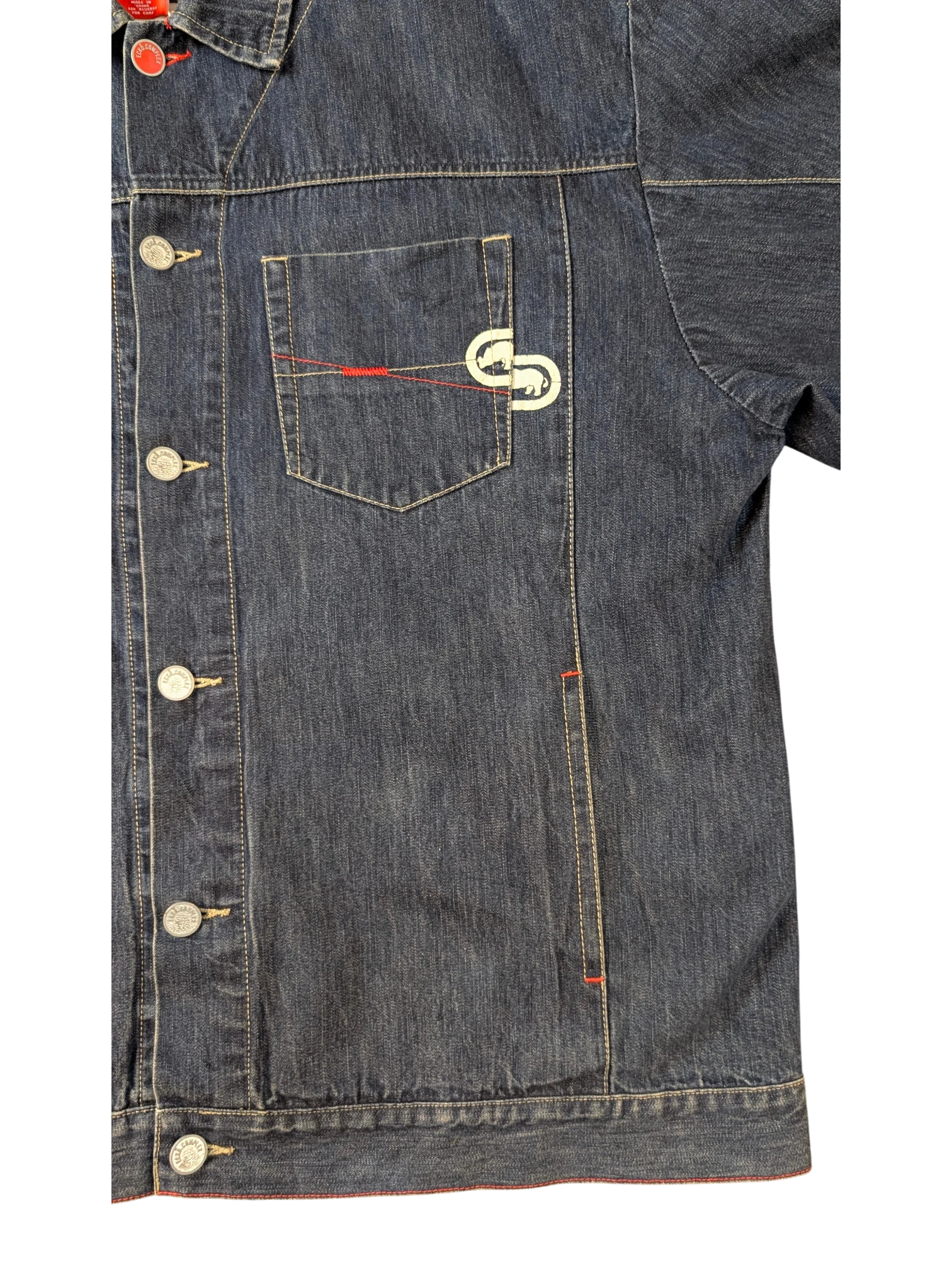 JAKE & IPI blue denim jacket with red stitching detail and embroidered logo on chest pocket.