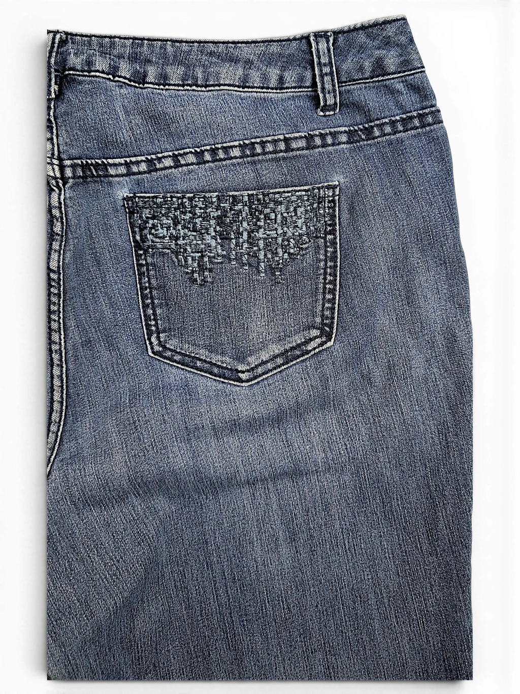 JAKE & IPI CJ Banks blue denim jeans featuring a back pocket with intricate dark blue woven embroidery detail