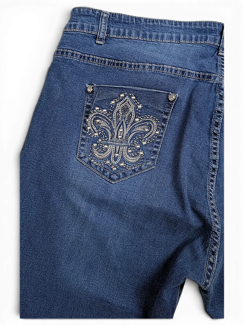 JAKE & IPI blue denim jeans featuring a back pocket with a decorative silver rhinestone fleur-de-lis emblem.