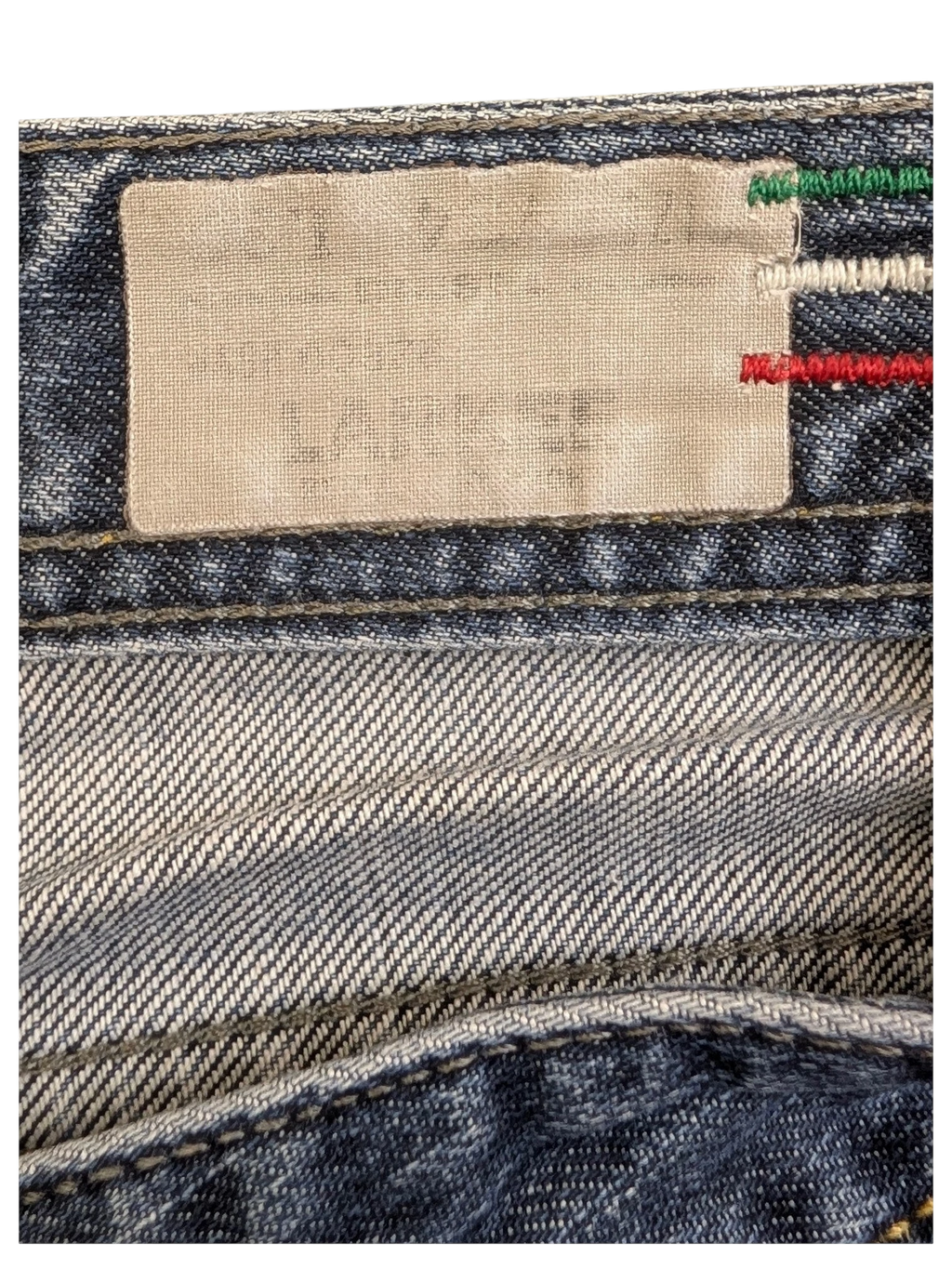 JAKE & IPI blue denim jeans with a size label and Italian flag stitching detail.