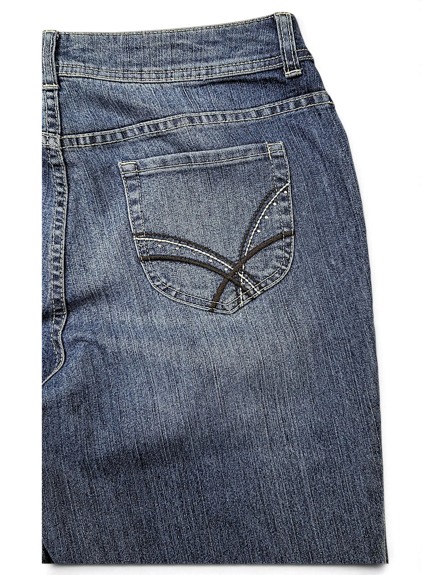 JAKE & IPI Additions by Chico's blue denim shorts featuring back pockets with decorative stitching and subtle studs