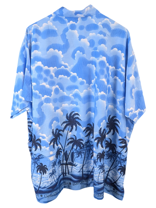 JAKE & IPI blue Hawaiian shirt featuring a tropical beach scene with palm trees and clouds, back view.