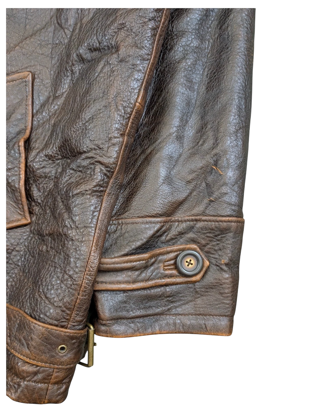 JAKE & IPI brown distressed leather jacket with button detail on cuff and adjustable buckle at hem.