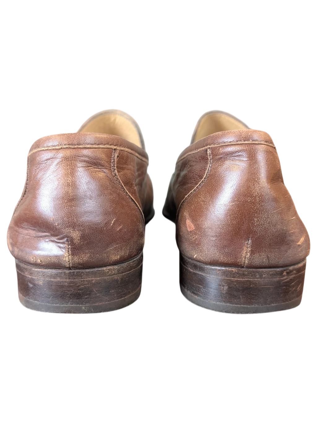 JAKE & IPI brown leather loafers viewed from the back showing worn heel detail