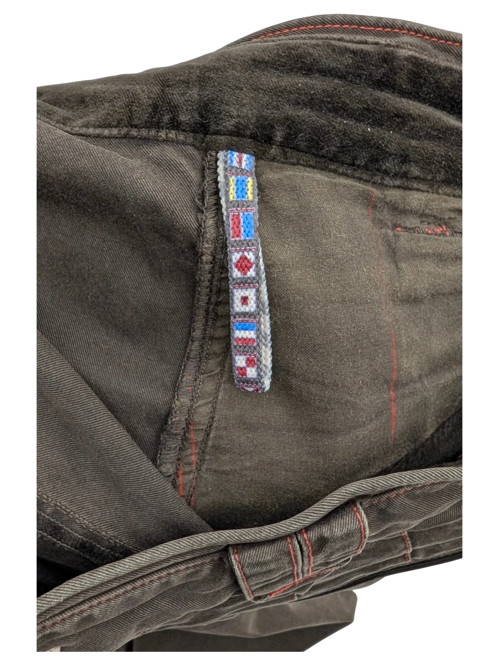 JAKE & IPI dark brown cargo pants with nautical flag trim detail and red stitching.