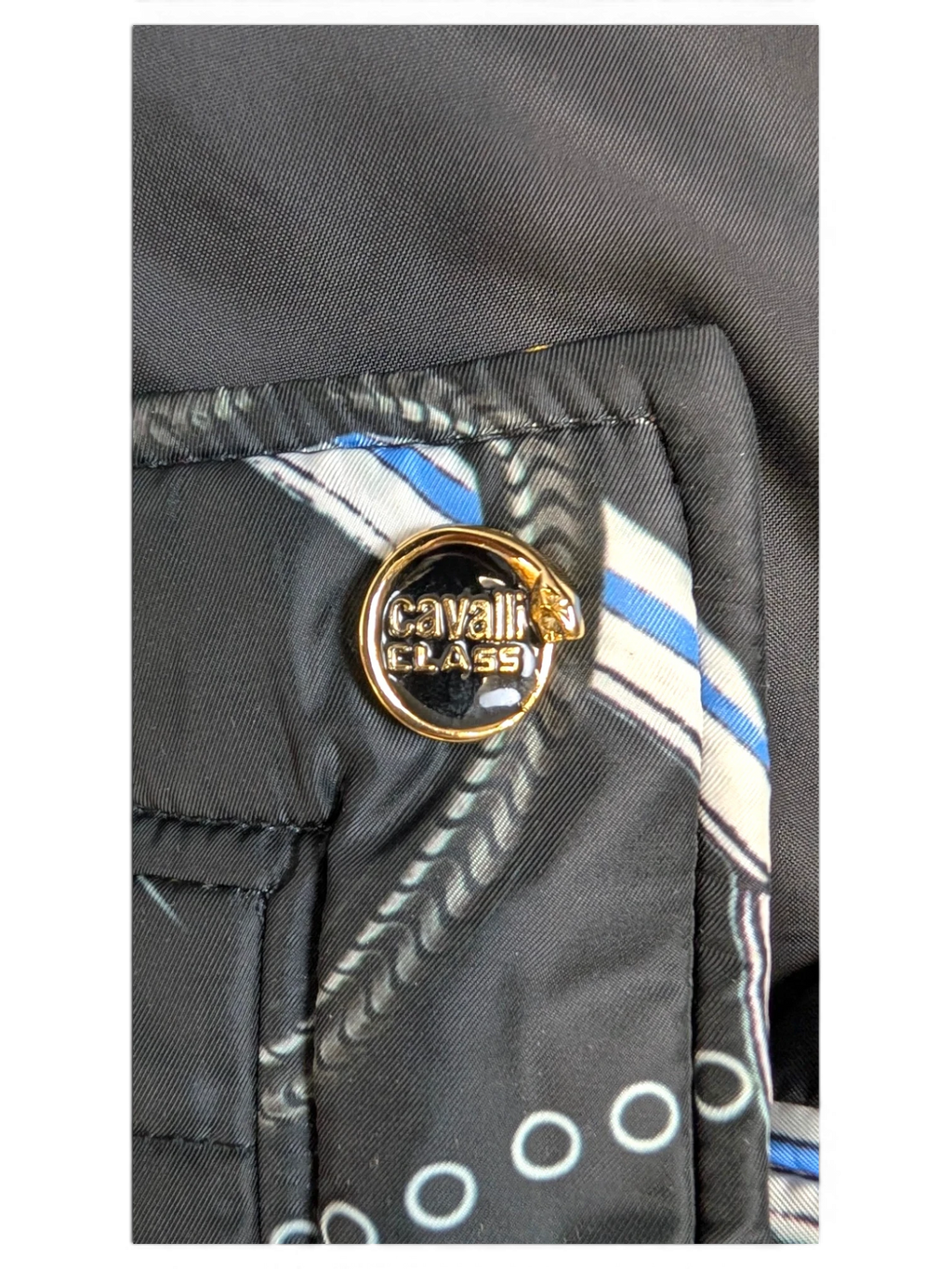 JAKE & IPI Cavalli Class black quilted cropped jacket with chain and snake print, gold logo buttons.