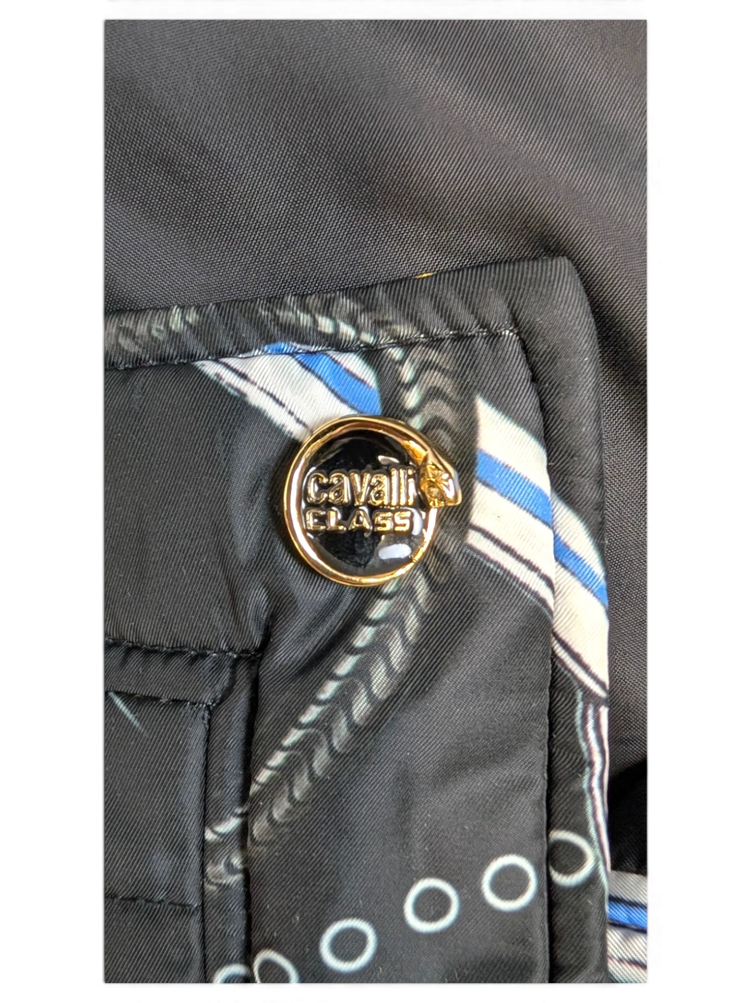 JAKE & IPI Cavalli Class black quilted cropped jacket with chain and snake print, gold logo buttons.