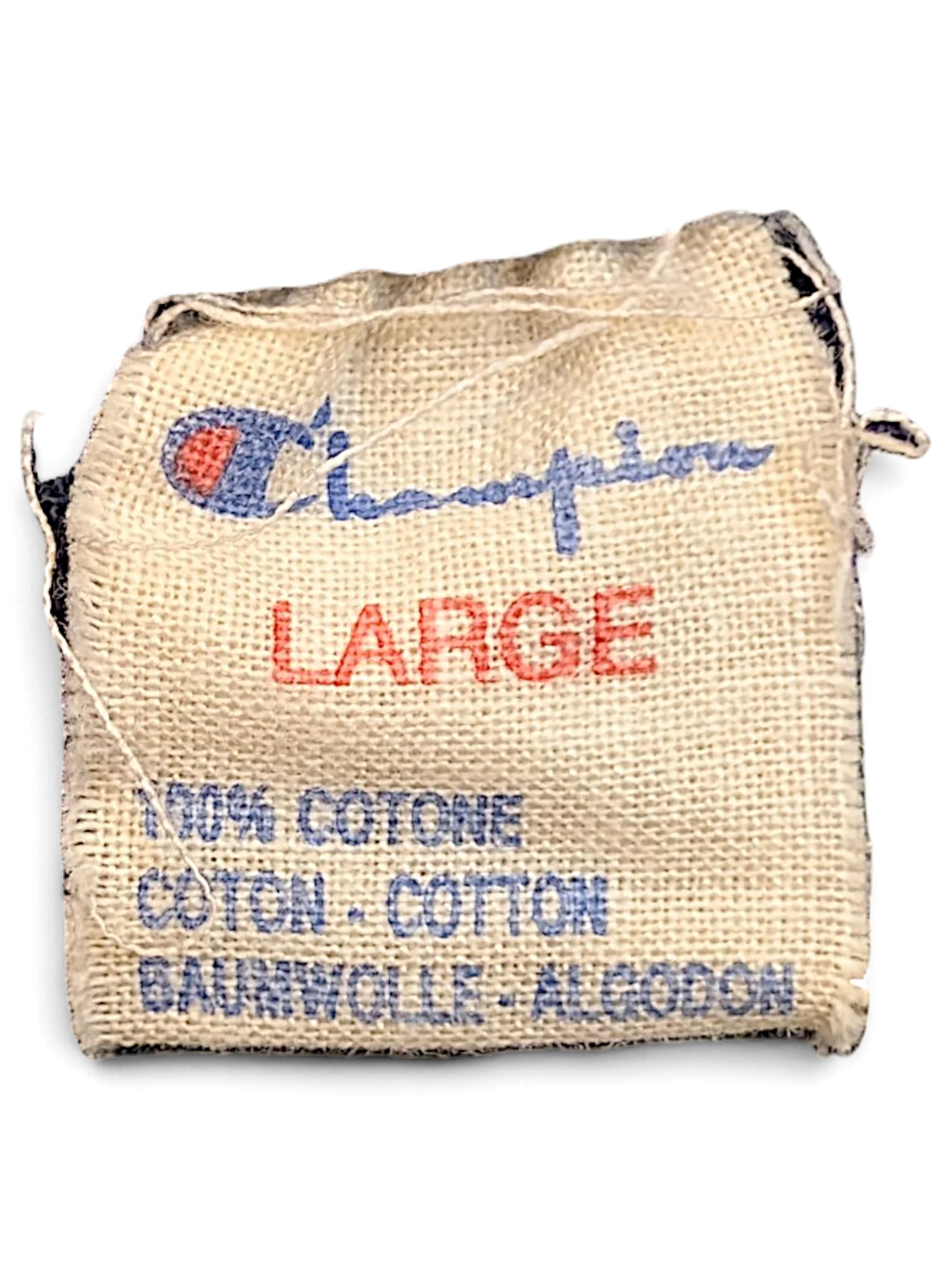 JAKE & IPI Champion brand clothing label showing size Large and 100% cotton composition on a woven fabric tag.