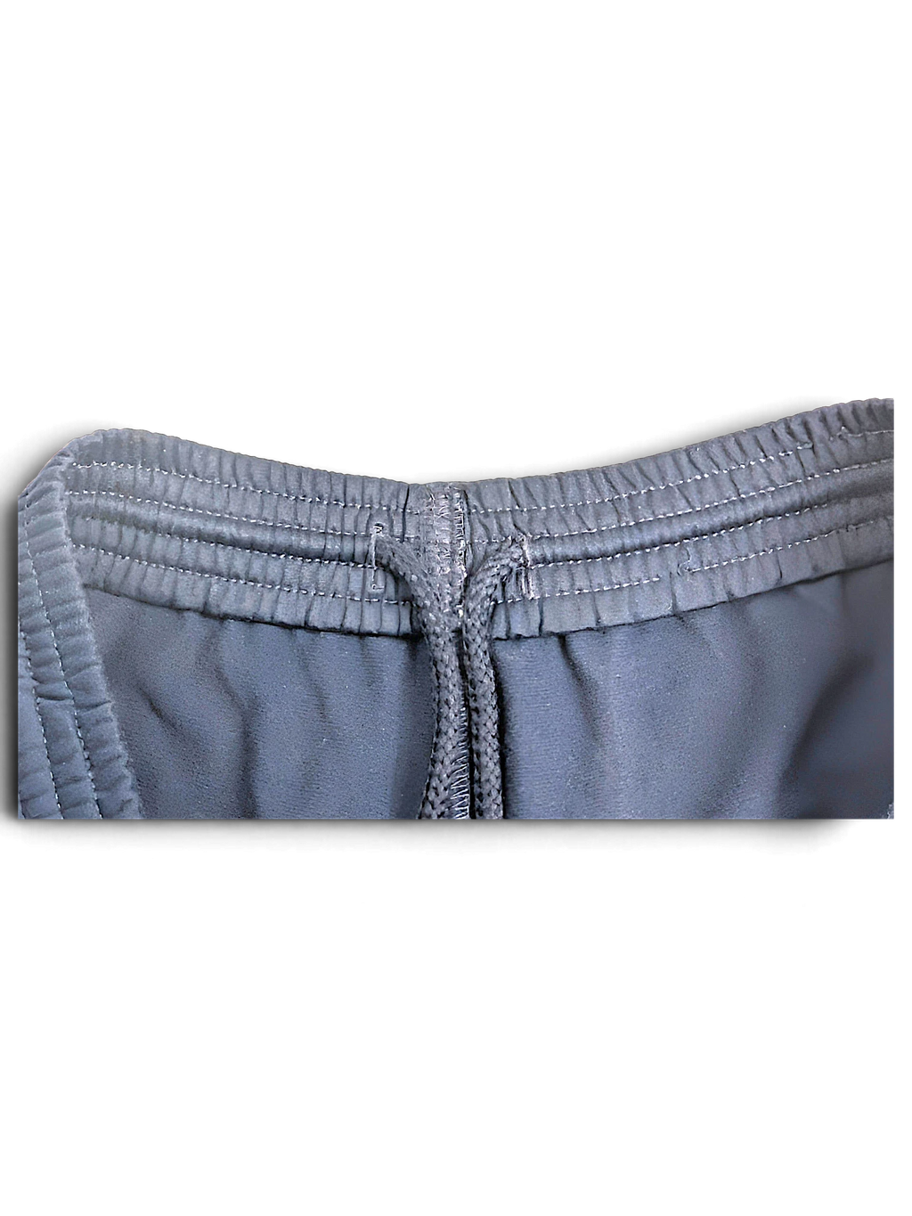 JAKE & IPI Champion navy blue track pants featuring an elasticated waistband with a drawstring detail