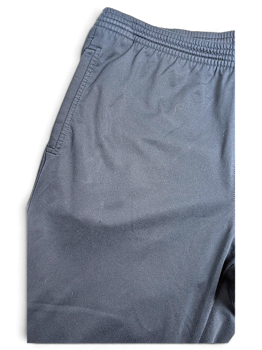 JAKE & IPI pre-owned Champion navy blue track pants with an elasticated waistband and comfortable open-hem design.