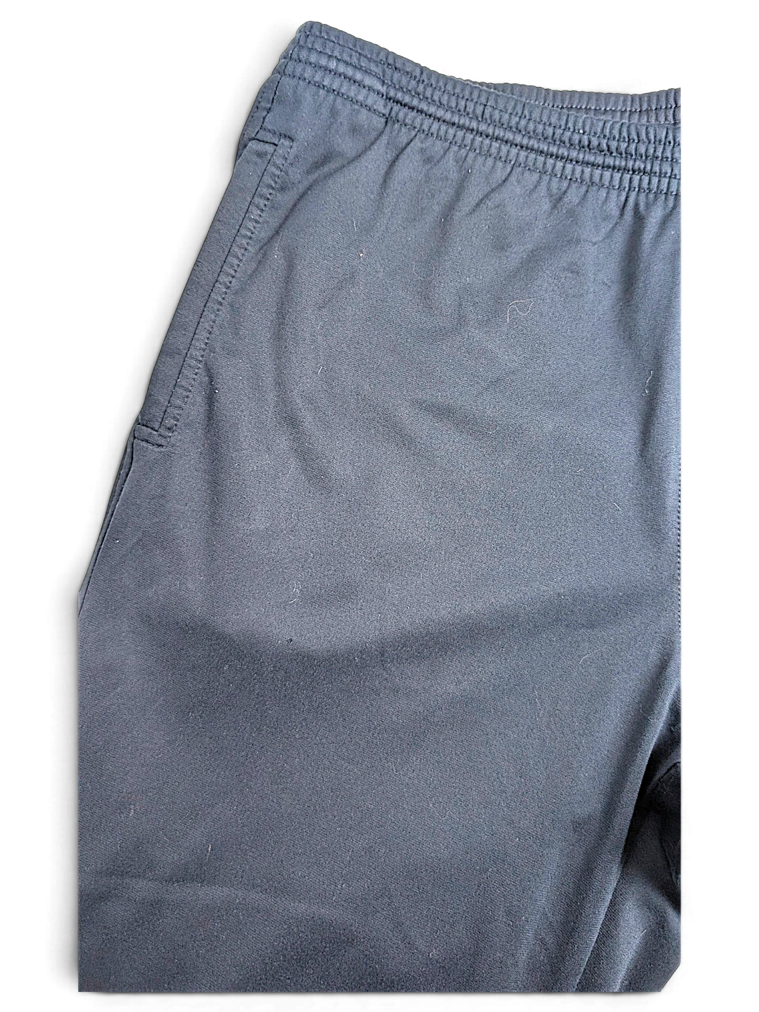 JAKE & IPI pre-owned Champion navy blue track pants with an elasticated waistband and comfortable open-hem design.