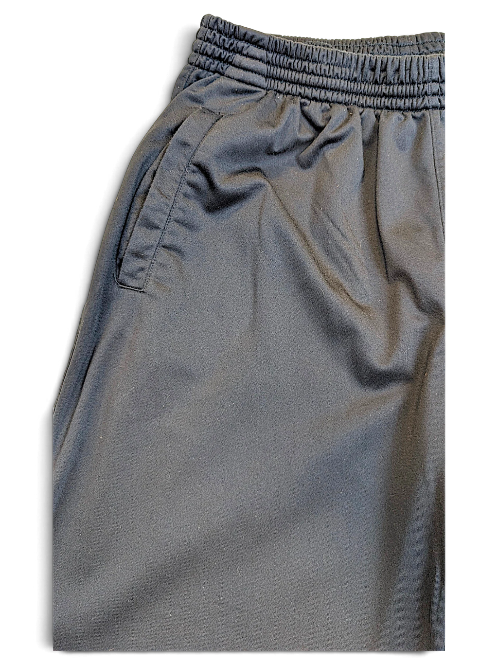 JAKE & IPI pre-owned Champion navy track pants with an elasticated waistband and side pocket detail