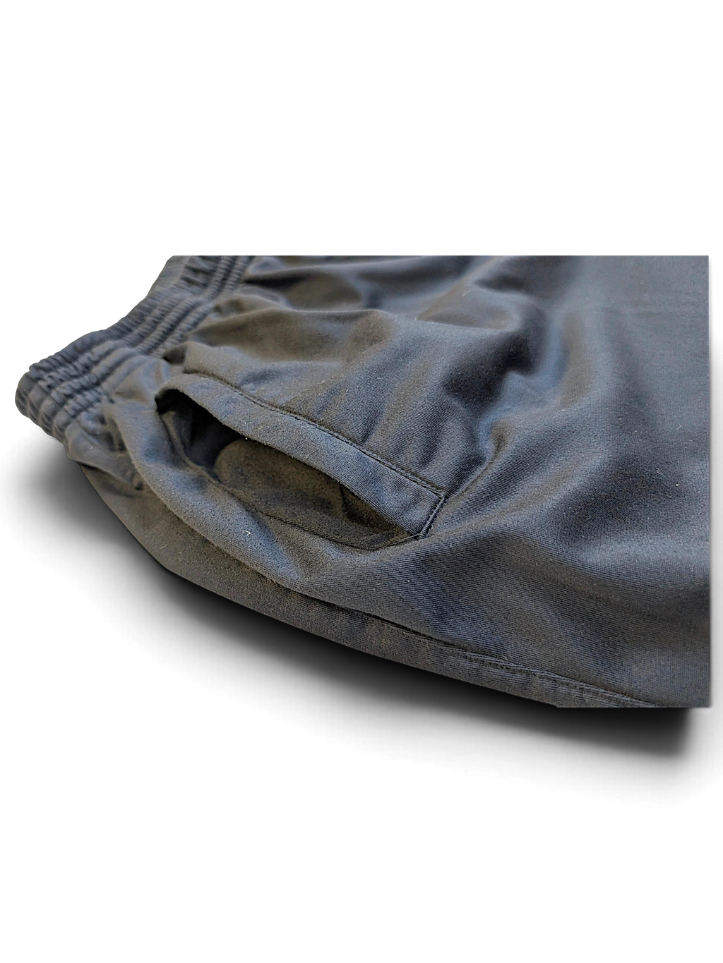 JAKE & IPI pre-owned Champion navy track pants featuring an elasticated waistband and side pocket detail