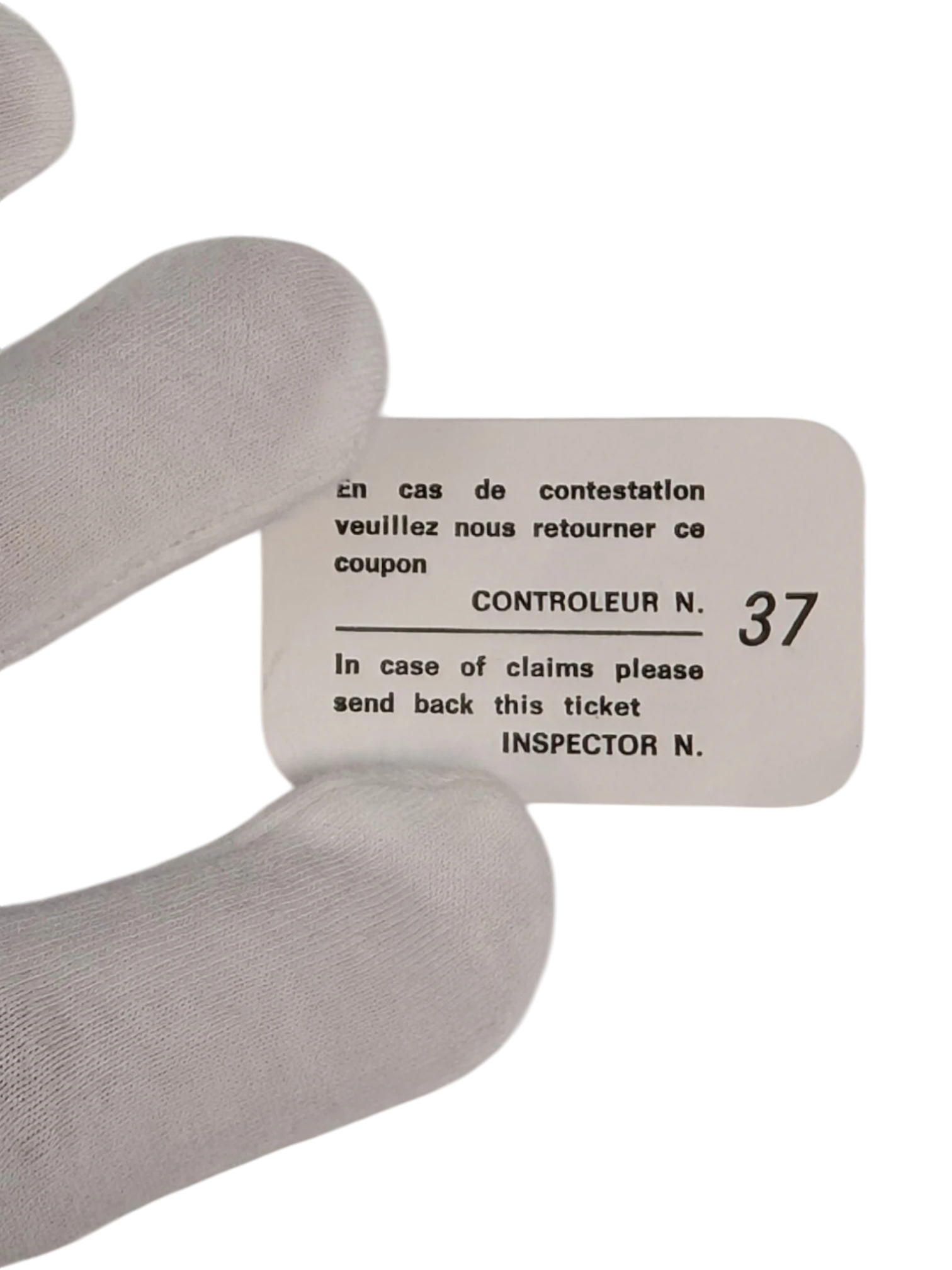 JAKE & IPI white ticket with French and English text for claims, inspector number 37.