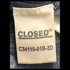 JAKE & IPI Closed brand denim jeans interior care label with model number C34119-01B-3D on blue fabric