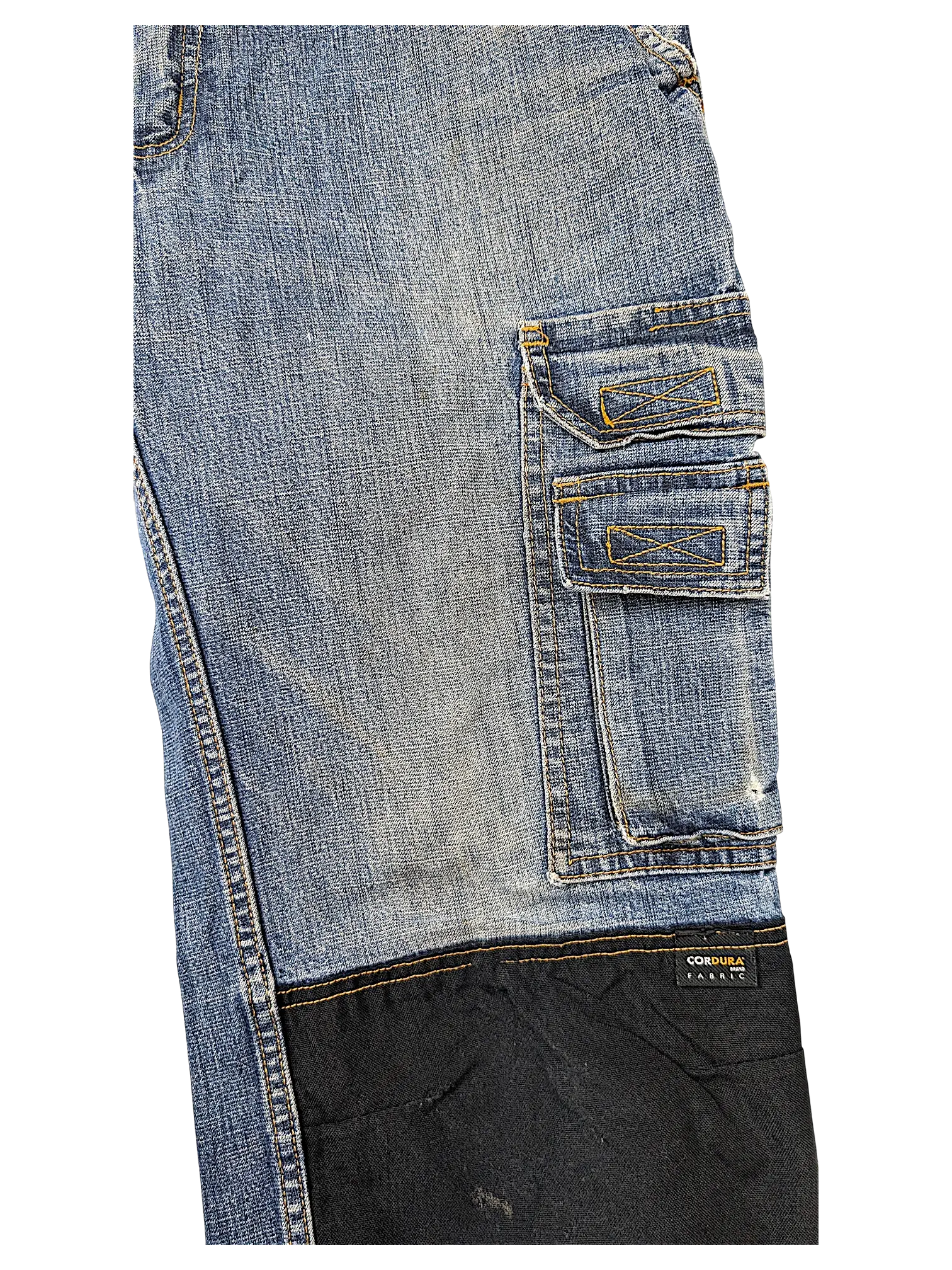 JAKE & IPI blue denim cargo jeans featuring durable black Cordura brand fabric reinforced panels on the lower leg.
