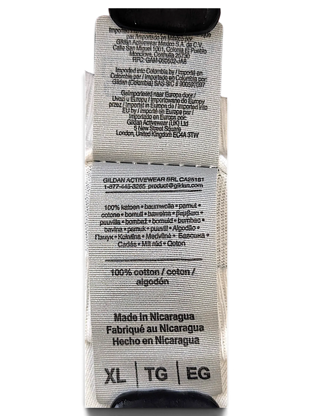 JAKE & IPI IBE Melo glitter T-Shirt fabric care label showing 100% cotton composition and XL size tag