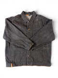 JAKE & IPI dark wash denim jacket with button closure and chest pockets.