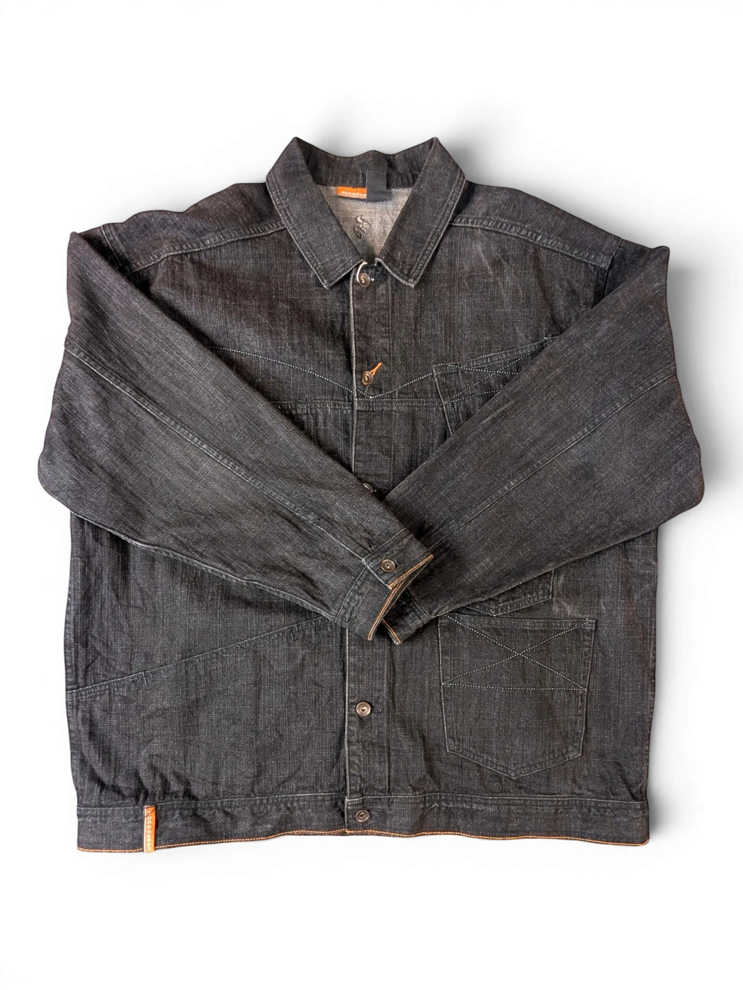 JAKE & IPI dark wash denim jacket with button closure and chest pockets.