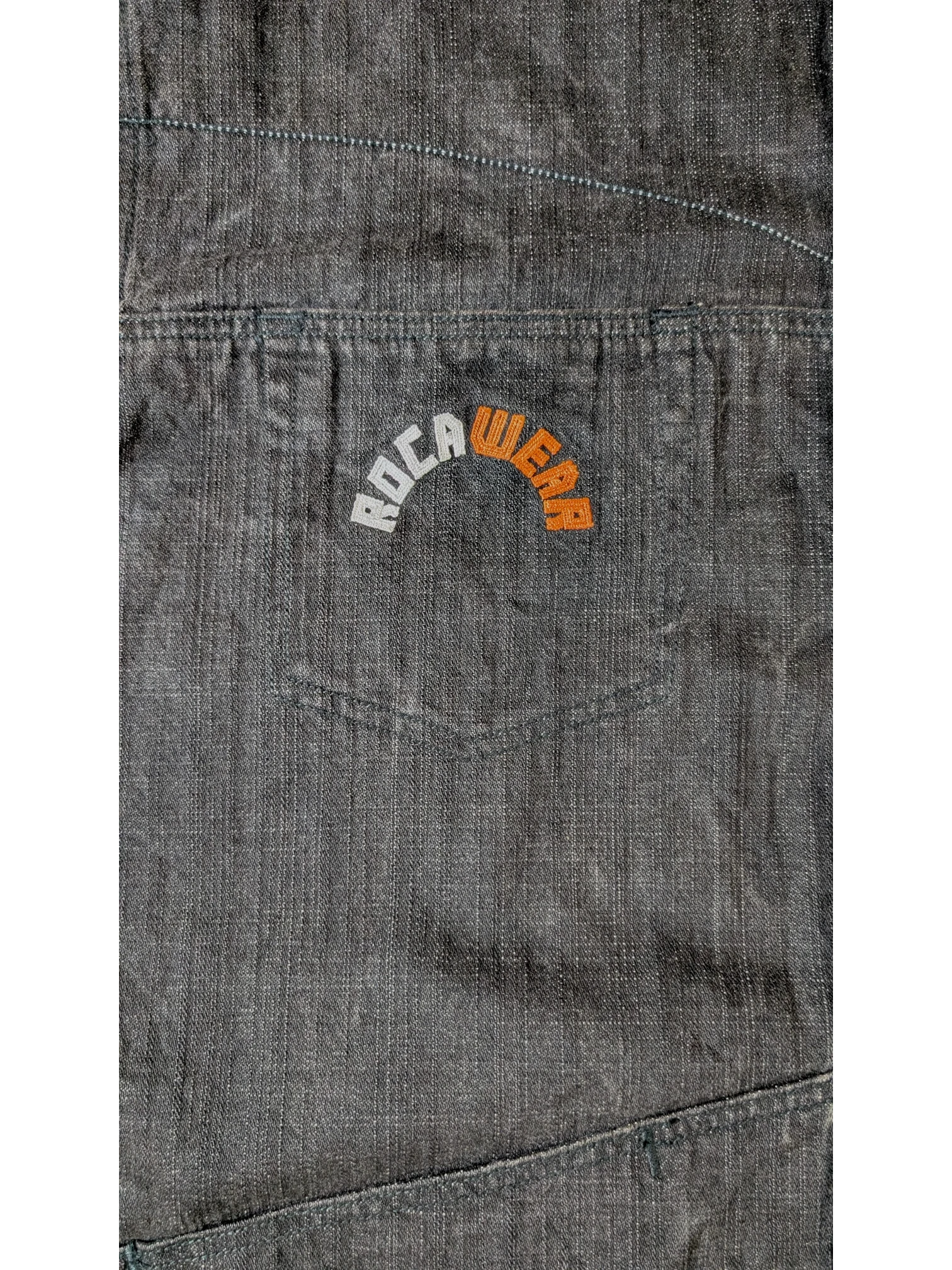 JAKE & IPI dark grey denim jacket with embroidered Rocawear logo on chest pocket.