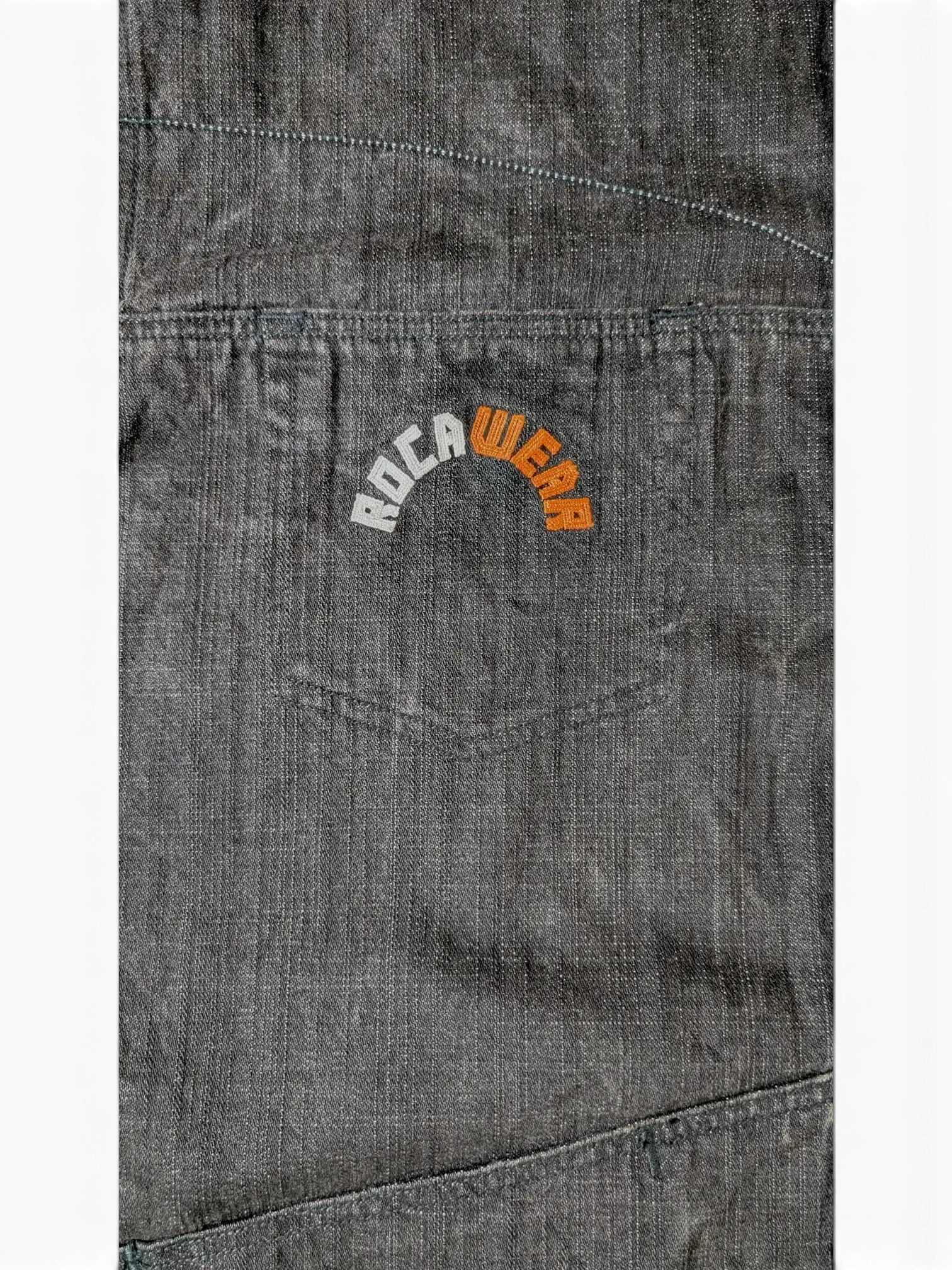 JAKE & IPI dark grey denim jacket with embroidered Rocawear logo on chest pocket.