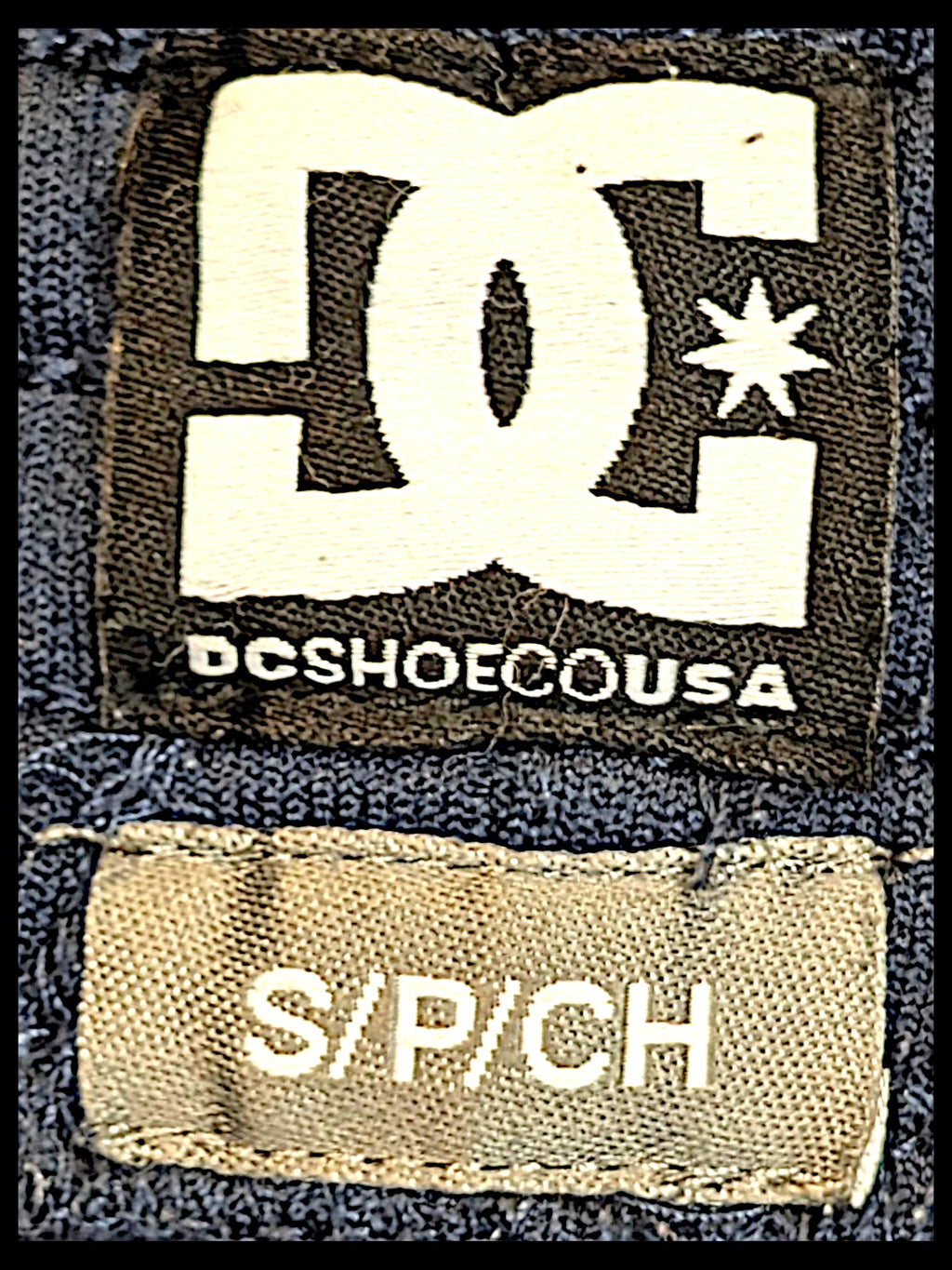 JAKE & IPI pre-owned DC track pants size small clothing label with logo and sizing details