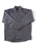 JAKE & IPI Willie Esco denim jacket with quarter zip, button cuffs, and brass stud details.