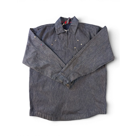 JAKE & IPI Willie Esco denim jacket with quarter zip, button cuffs, and brass stud details.