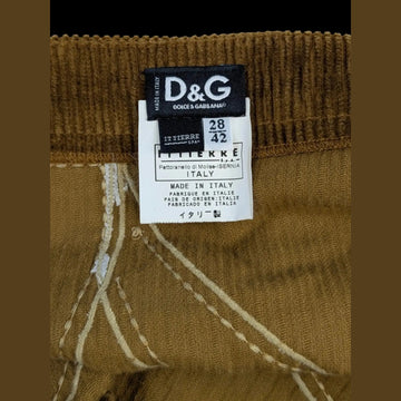JAKE & IPI D&G Dolce & Gabbana ruskea vakosamettinen minihame, sävy sävyyn applikaatiopaneelit ja kontrastitikkaukset. Y2K-aikakausi.
