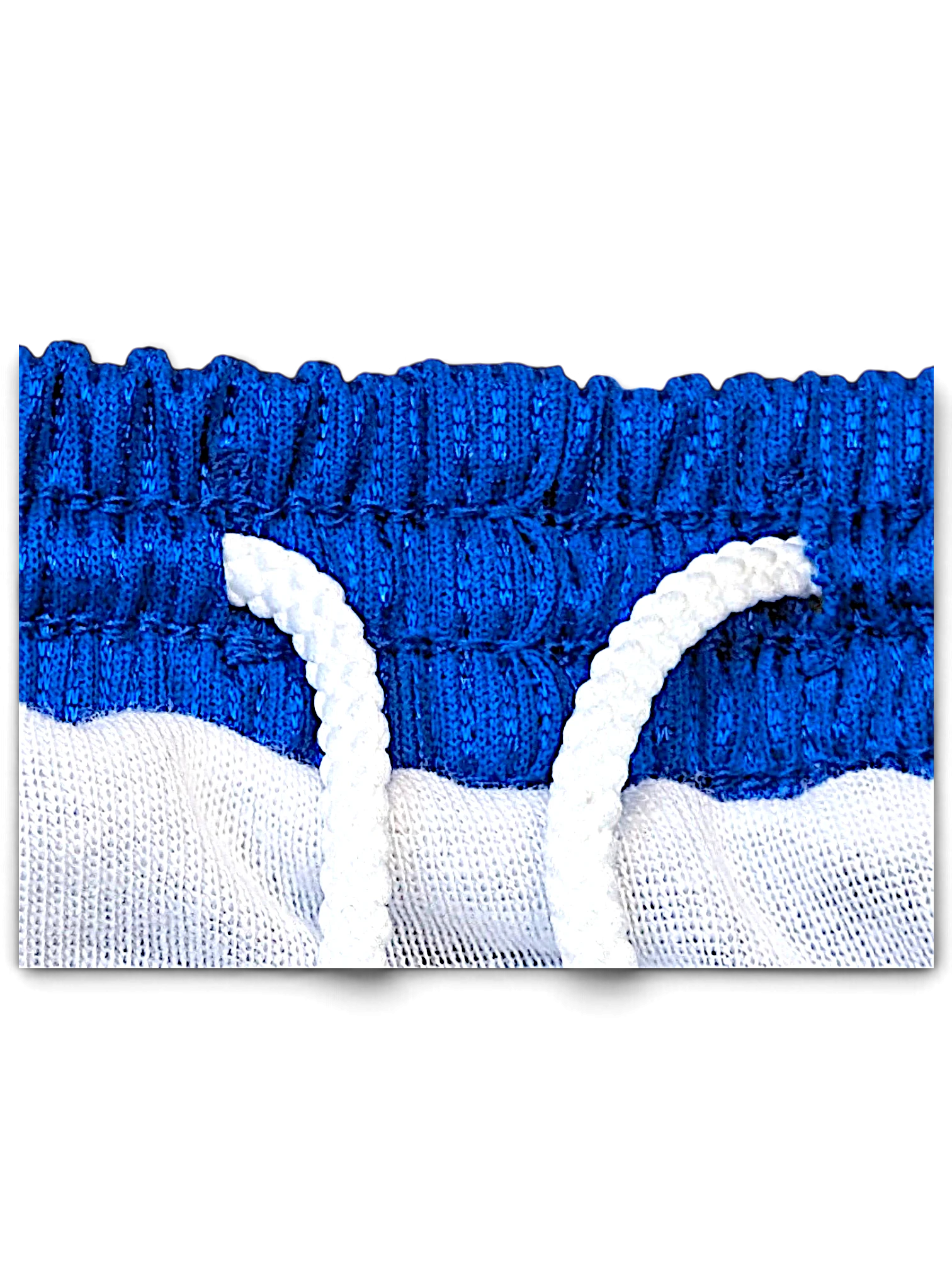 JAKE & IPI Diadora Real royal-blue football shorts showing the internal white drawcord