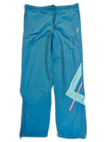 JAKE & IPI pre-owned Diadora faded light blue track pants with relaxed fit, embroidered logo, and geometric accents.