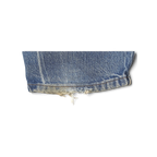 JAKE & IPI Dickies jeans leg hem showing distressed frayed denim detail in medium blue wash
