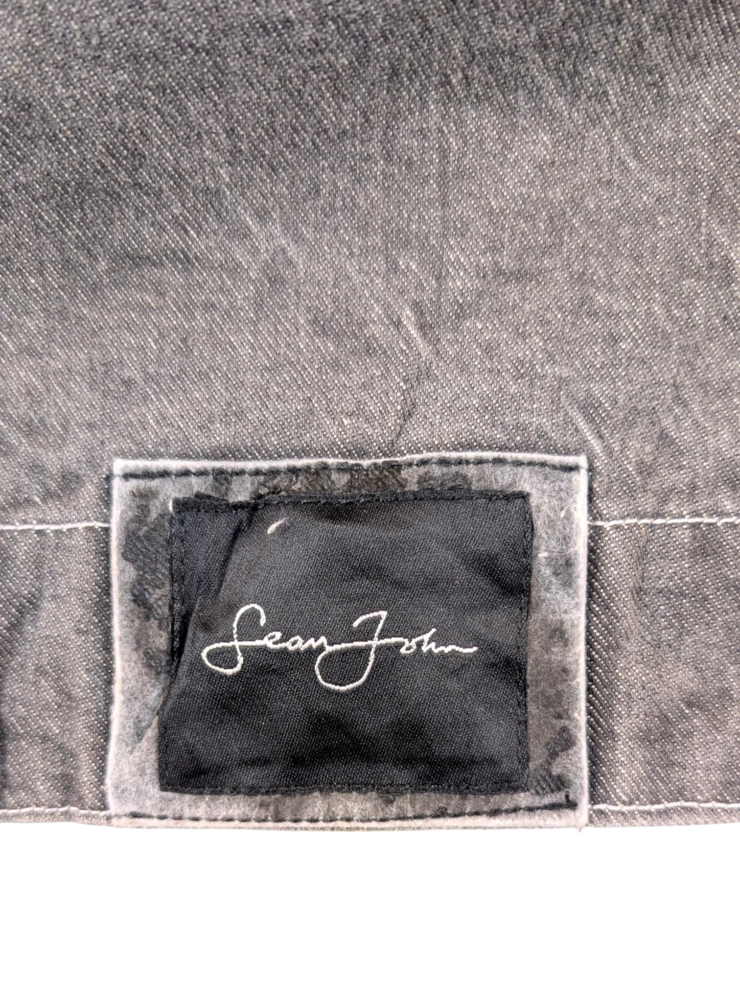 JAKE & IPI Diddy denim jacket in charcoal grey with Sean John logo patch.