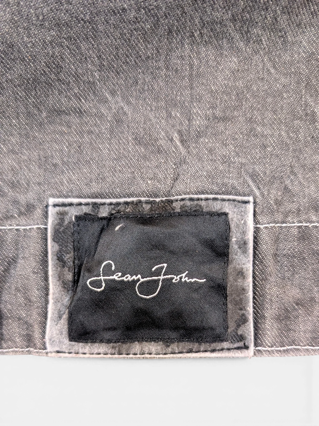 JAKE & IPI Diddy denim jacket in charcoal grey with Sean John logo patch.