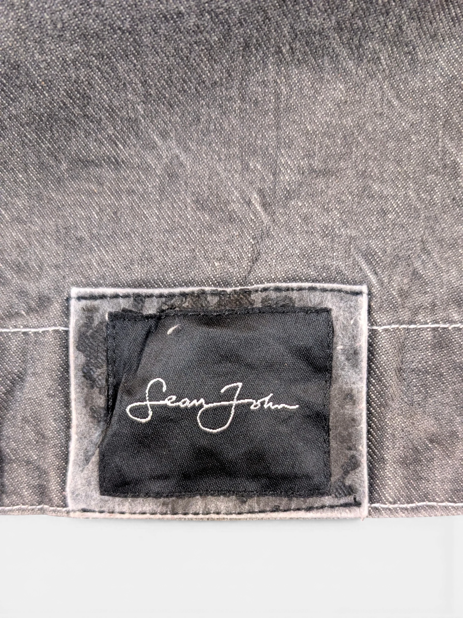 JAKE & IPI Diddy denim jacket in charcoal grey with Sean John logo patch.