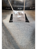 JAKE & IPI Diddy denim jacket with Sean John branding and care label.