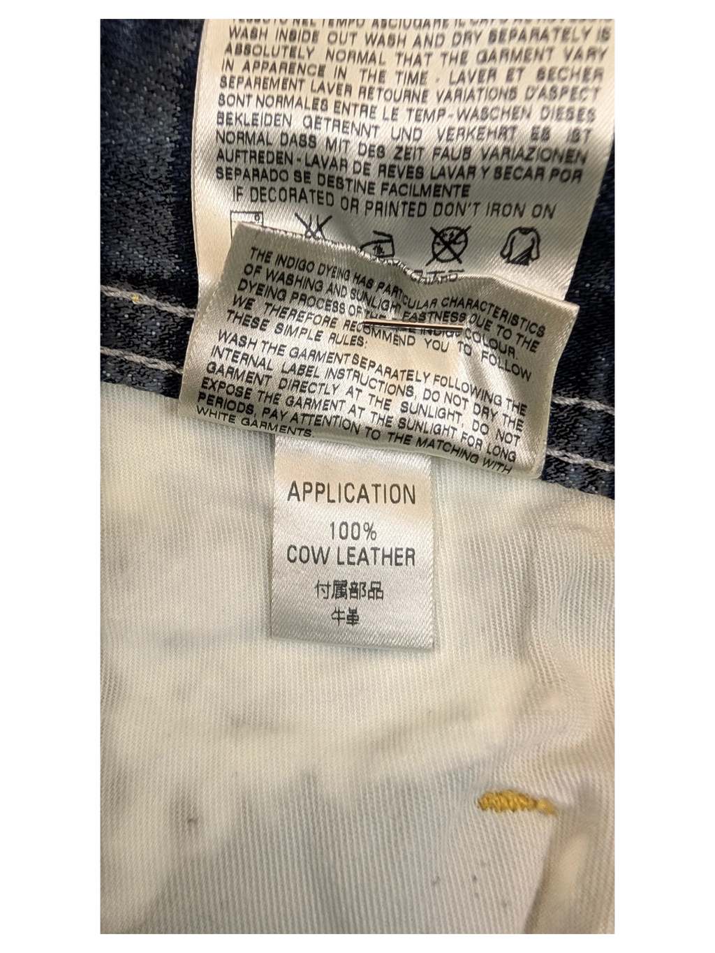 JAKE & IPI Diesel Poiak jeans label showing 100% cow leather application.
