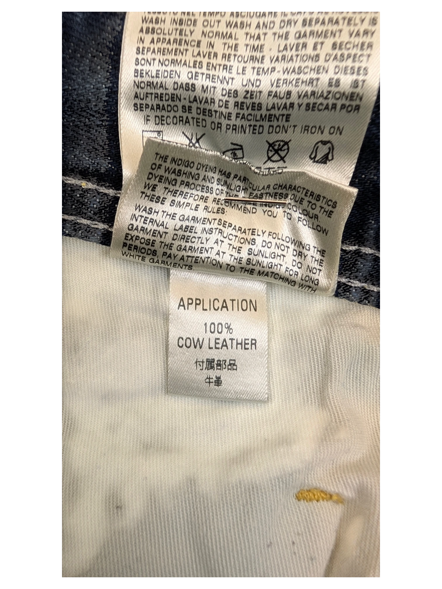 JAKE & IPI Diesel Poiak jeans label showing 100% cow leather application.