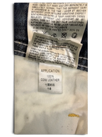 JAKE & IPI Diesel Poiak jeans label showing 100% cow leather application.
